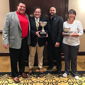 NGU Administrators holding the Body Mind Soul Award