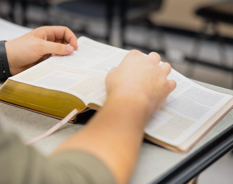 student studying the Bible