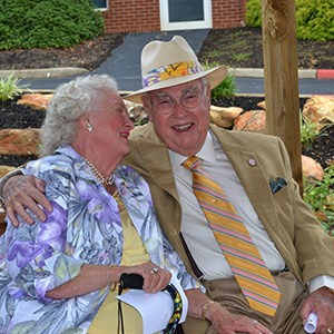 Dr. Joe Frank Hayes Sr. and wife smiling.