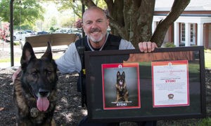 Canine Stoki and handler William Farina