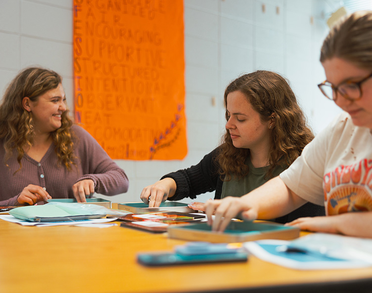 students working on project together in classroom