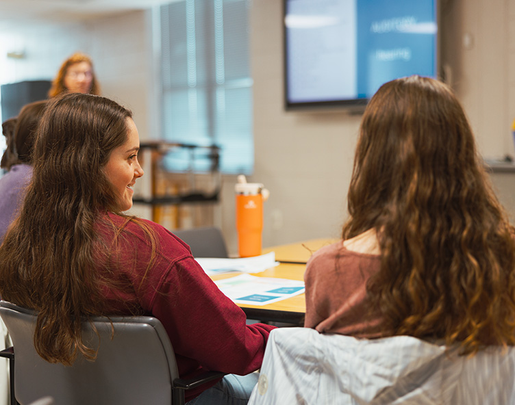 students chatting in classroom
