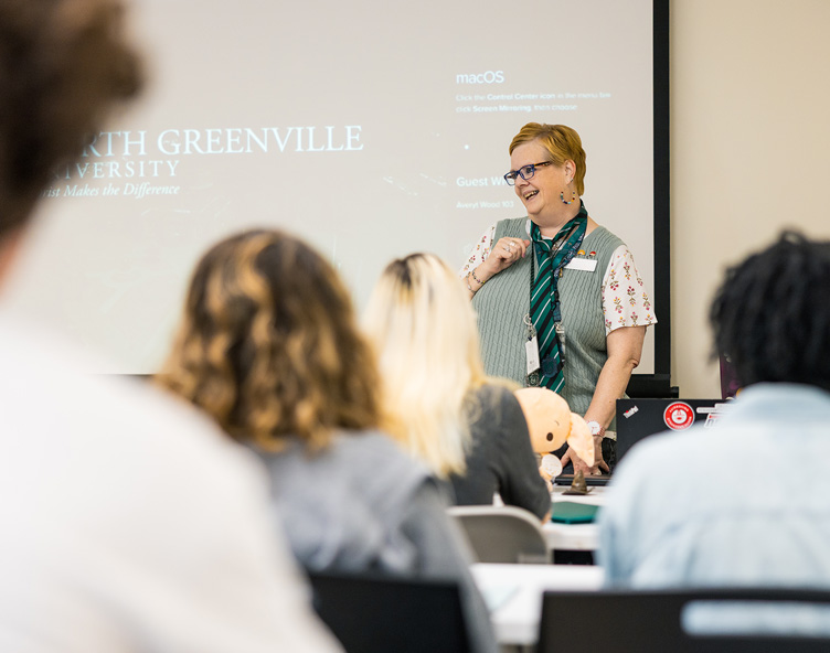 Professor teaching a classroom of students