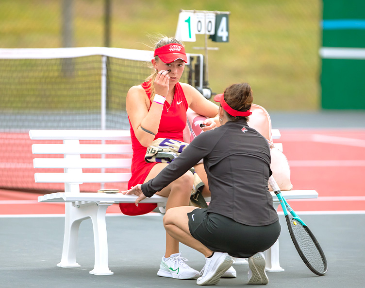 coach at a tennis match