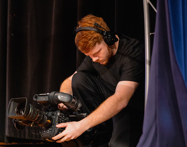 a student livestreaming a Chapel service