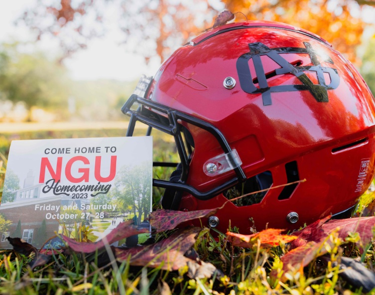 NGU helmet and postcard