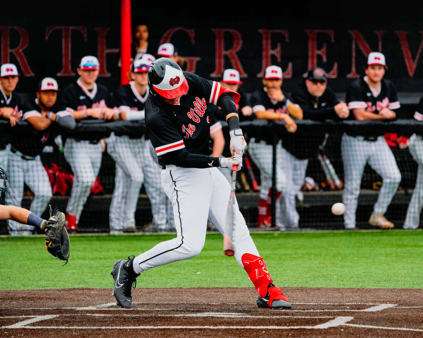 NGU student playing softball