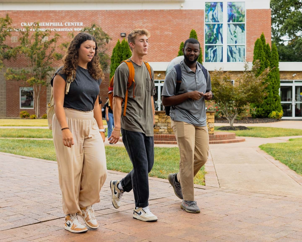 student walking through campus
