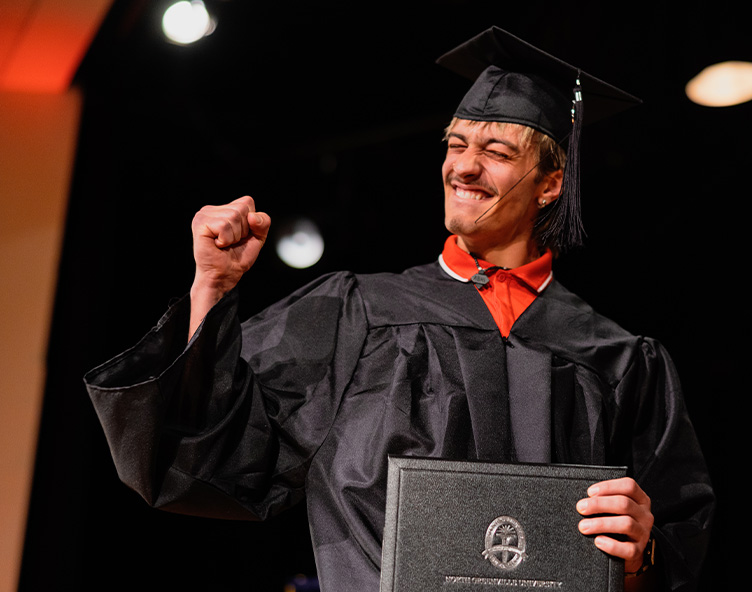 student celebrating as graduation ceremony