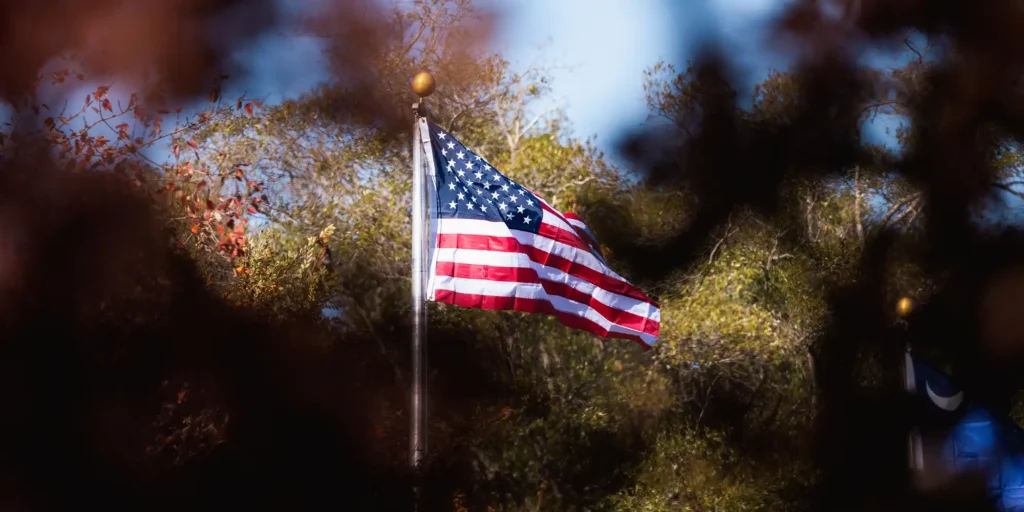 american flag blowing in the wind
